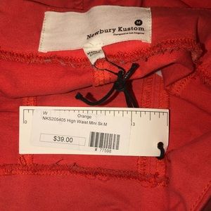 Brand new orange Lush mini skirt!